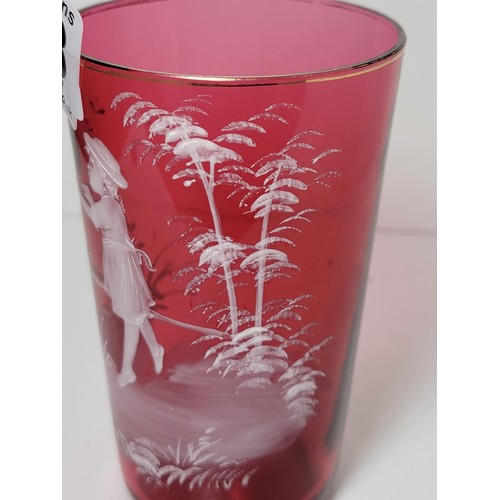 158 - Good quality antique Mary Gregory cranberry tumbler with white enamelling design of a girl chasing b... 