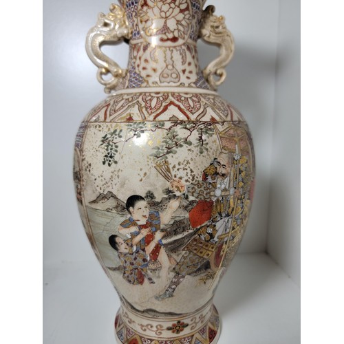 163 - Pair of antique Satsuma hand painted vases, with lion handles, scenes depicting oriental figures, tw... 