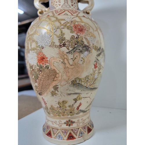 163 - Pair of antique Satsuma hand painted vases, with lion handles, scenes depicting oriental figures, tw... 