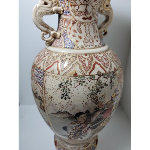 163 - Pair of antique Satsuma hand painted vases, with lion handles, scenes depicting oriental figures, tw... 