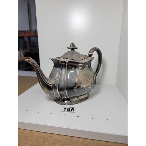 166 - Hallmarked silver teapot by Harry Atkin, Sheffield 1921, with inscription to the front for acts of h... 