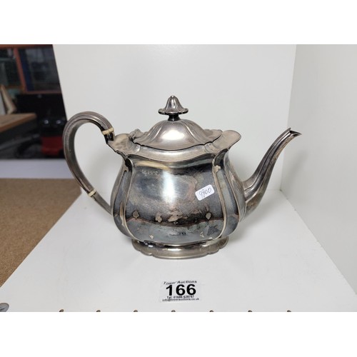 166 - Hallmarked silver teapot by Harry Atkin, Sheffield 1921, with inscription to the front for acts of h... 