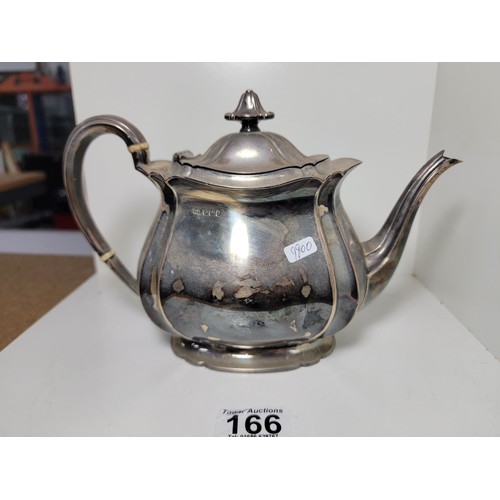 166 - Hallmarked silver teapot by Harry Atkin, Sheffield 1921, with inscription to the front for acts of h... 