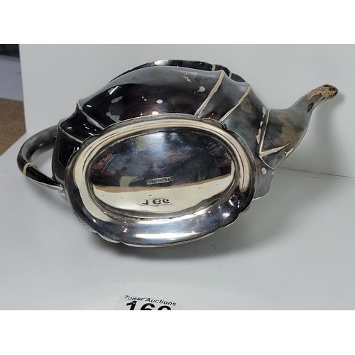 166 - Hallmarked silver teapot by Harry Atkin, Sheffield 1921, with inscription to the front for acts of h... 