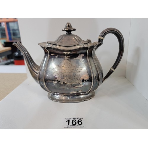 166 - Hallmarked silver teapot by Harry Atkin, Sheffield 1921, with inscription to the front for acts of h... 