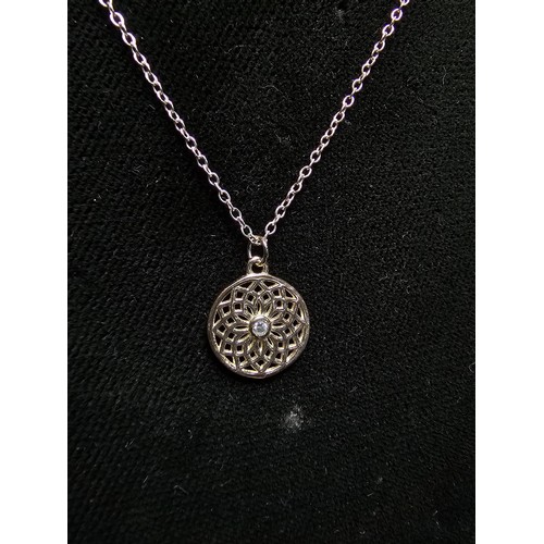 204 - A 925 silver pendant inset with a crystal CZ stone on an 18