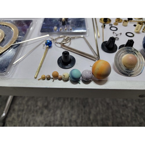 78 - A good quality sun, moon and earth orrery model with accessories including arms, extra planets, etc.