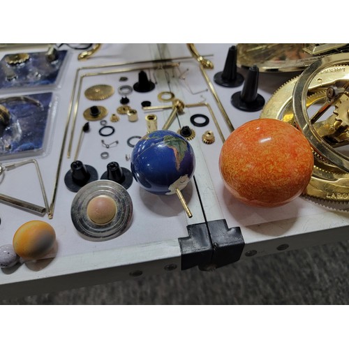 78 - A good quality sun, moon and earth orrery model with accessories including arms, extra planets, etc.