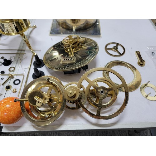 78 - A good quality sun, moon and earth orrery model with accessories including arms, extra planets, etc.