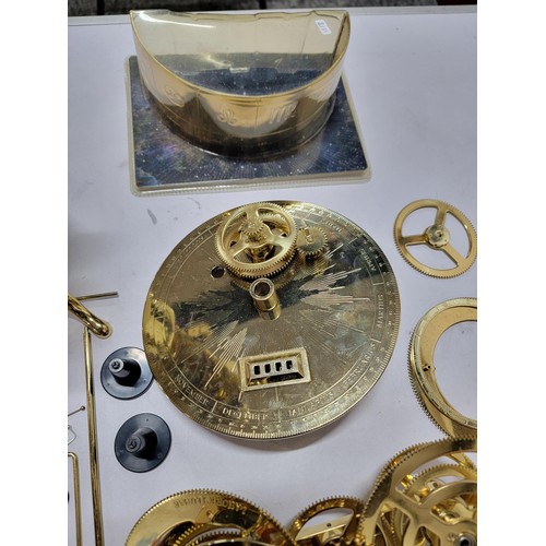 78 - A good quality sun, moon and earth orrery model with accessories including arms, extra planets, etc.