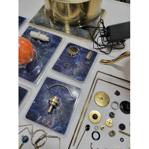 78 - A good quality sun, moon and earth orrery model with accessories including arms, extra planets, etc.