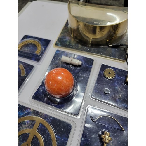 78 - A good quality sun, moon and earth orrery model with accessories including arms, extra planets, etc.