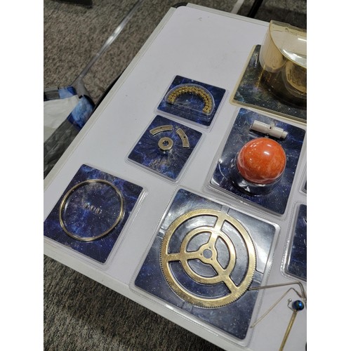 78 - A good quality sun, moon and earth orrery model with accessories including arms, extra planets, etc.