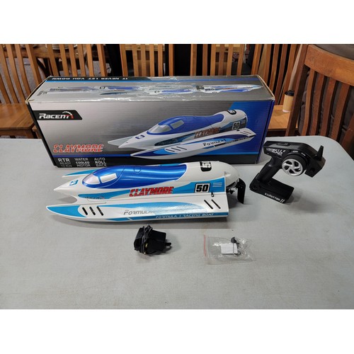 6 - Boxed RaceNT Claymore Remote Controlled speed boat - goes 31MPH in good condition appears to have ha... 