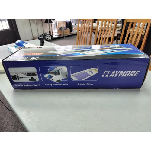 6 - Boxed RaceNT Claymore Remote Controlled speed boat - goes 31MPH in good condition appears to have ha... 