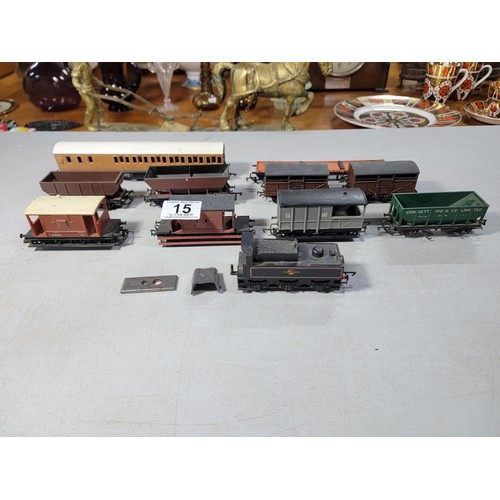 15 - Box of 00 gauge rolling stock along with a dummy locomotive with various brands inc Hornby, Tri-ang ... 