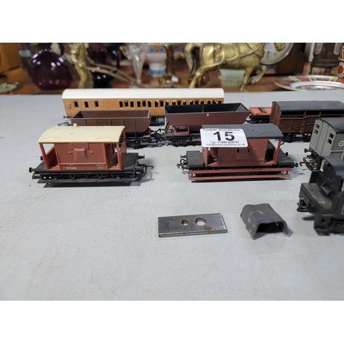 15 - Box of 00 gauge rolling stock along with a dummy locomotive with various brands inc Hornby, Tri-ang ... 