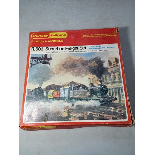 29 - Boxed Hornby train set R503 Suburban Freight set containing electric loco, 3x wagons, guards van and... 