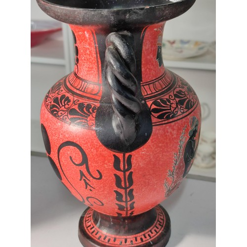 A large West German stamped vase marked 517-38 to the base with a brown ...