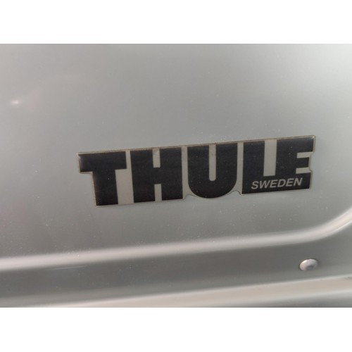 366 - A Thule motion 200 car shuttle complete with Thule roof rails and keys complete with instructions wi... 