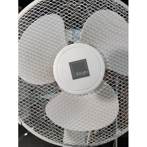 367 - A floor standing electric fan with 3 speed controls along with a 5 division metal tealight holder wi... 