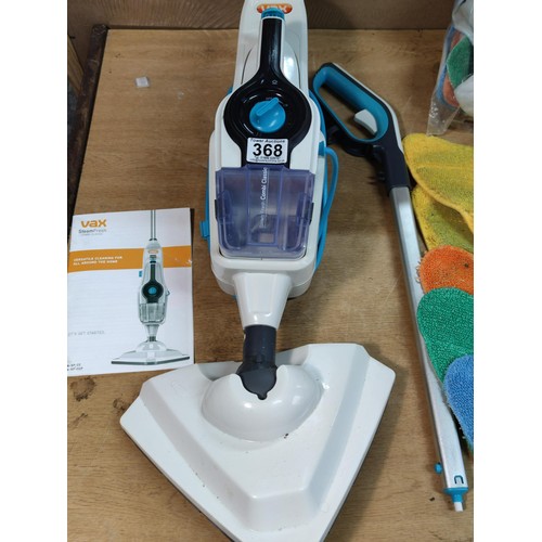 368 - A Vax Steamfresh combi classic steamer complete with a collection of cleaning pads, accessories and ... 