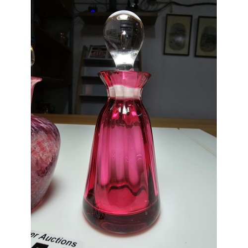 154 - 2x good quality glass scent bottles to include a cranberry glass bottle by Dartington Glass, marked ... 