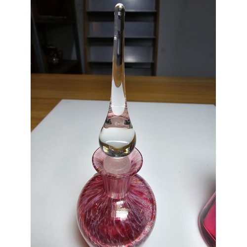 154 - 2x good quality glass scent bottles to include a cranberry glass bottle by Dartington Glass, marked ... 