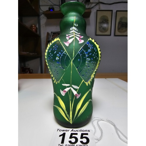 155 - Fine quality green hand painted art glass bottle vase along with a hand painted opaque glass jug. Th... 