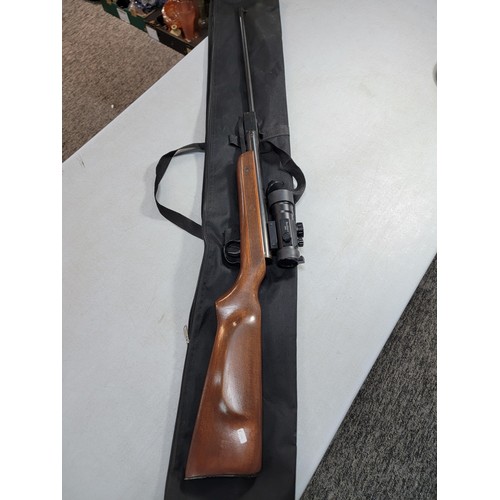 289 - A .22 cal Remmel air rifle complete with Bushnell 2 x 42 scope, vendor has fitted a new spring, in w... 