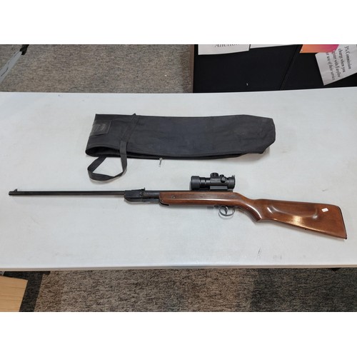 289 - A .22 cal Remmel air rifle complete with Bushnell 2 x 42 scope, vendor has fitted a new spring, in w... 