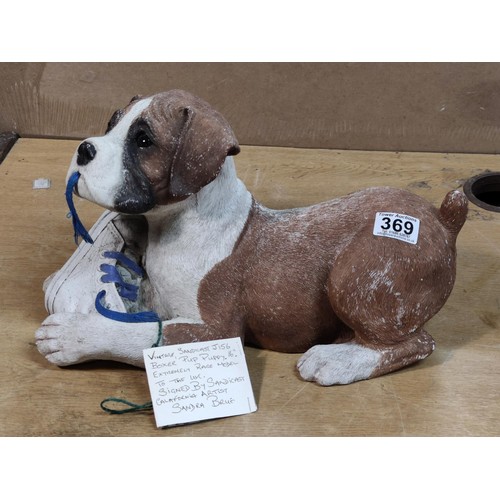 369 - A rare vintage very well cast Sandicast J156 boxer puppy. Signed to the base by Sandra brue, depicti... 