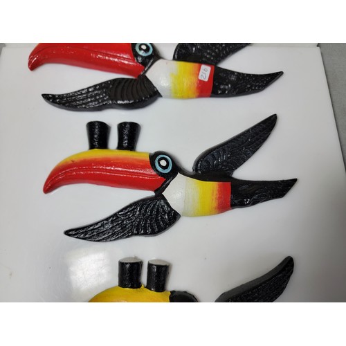 305C - A collection of 3 graduated cast iron Guinness toucans, all very colourful and well detailed. Larges... 