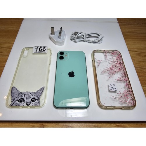 166 - An iphone 11 64gb mobile phone complete with 2x phone cases and an apple charger, phone is in full w... 