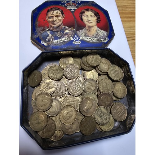 167 - 2x tubs full of vintage British coins to include a large quantity of brass 3 pence coins and a large... 