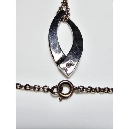 173 - 925 Silver pendant inset with a real Diamond on a 18 inch 925 Silver chain in clean condition