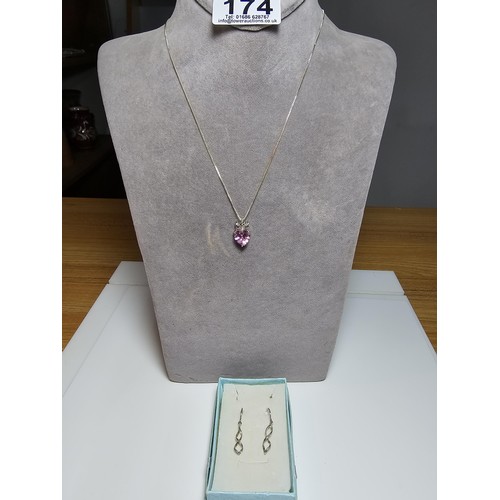 174 - Pretty 925 Silver pendant inset with a heart shaped pink CZ crystal stone on a 18 inch 925 Silver ch... 