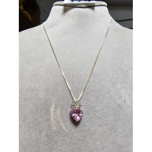 174 - Pretty 925 Silver pendant inset with a heart shaped pink CZ crystal stone on a 18 inch 925 Silver ch... 