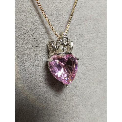 174 - Pretty 925 Silver pendant inset with a heart shaped pink CZ crystal stone on a 18 inch 925 Silver ch... 