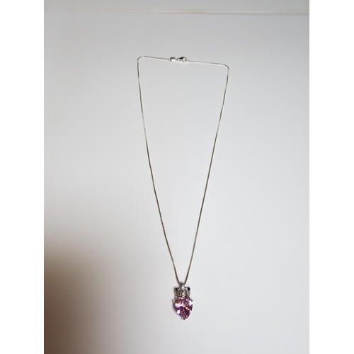 174 - Pretty 925 Silver pendant inset with a heart shaped pink CZ crystal stone on a 18 inch 925 Silver ch... 