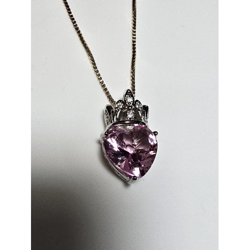 174 - Pretty 925 Silver pendant inset with a heart shaped pink CZ crystal stone on a 18 inch 925 Silver ch... 