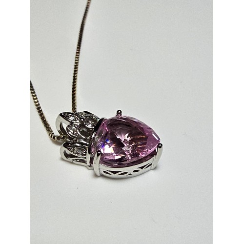 174 - Pretty 925 Silver pendant inset with a heart shaped pink CZ crystal stone on a 18 inch 925 Silver ch... 