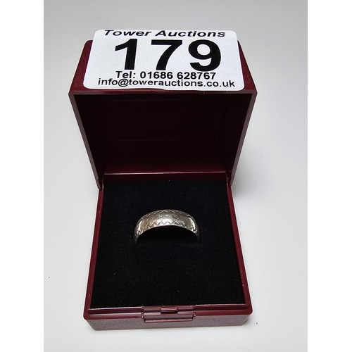 179 - Hallmarked Silver ring with an engraved design - size O in clean condition - boxed.