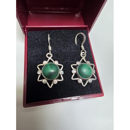 183 - Pair of vintage 925 Silver star formed drop earrings inset with green malachite stones presenting an... 