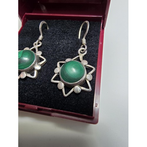 183 - Pair of vintage 925 Silver star formed drop earrings inset with green malachite stones presenting an... 