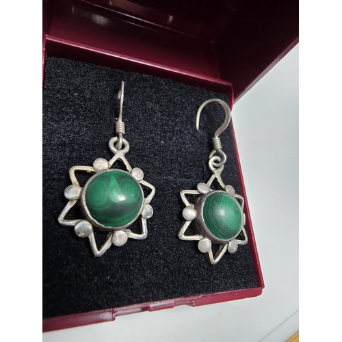 183 - Pair of vintage 925 Silver star formed drop earrings inset with green malachite stones presenting an... 