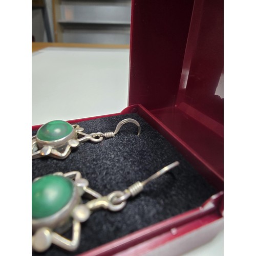 183 - Pair of vintage 925 Silver star formed drop earrings inset with green malachite stones presenting an... 