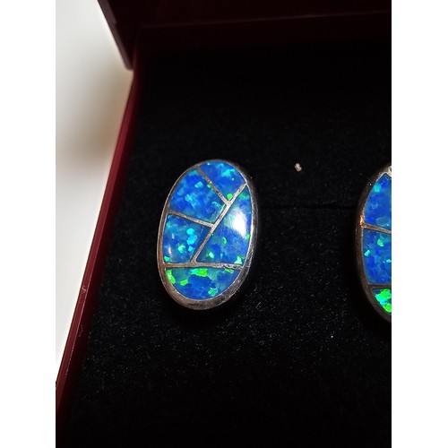 185 - Pair of stunning 925 Silver Opal Earrings inset with blue Opal have an excellent green flashing colo... 