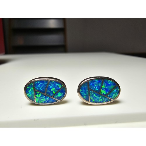 185 - Pair of stunning 925 Silver Opal Earrings inset with blue Opal have an excellent green flashing colo... 