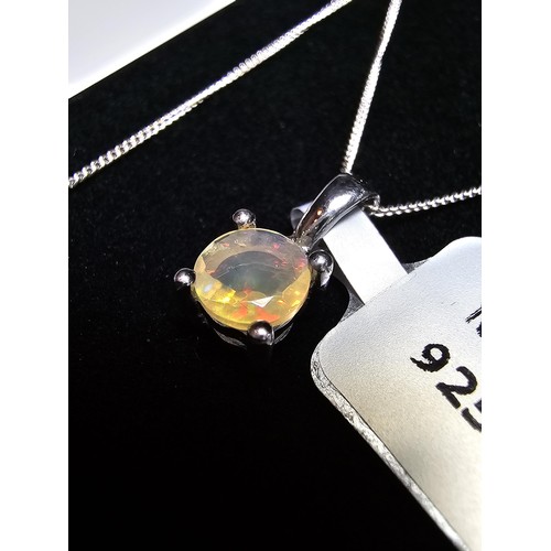 186 - As New Pretty 925 Silver Solitaire pendant inset with a genuine Ethiopian Opal stone presenting exce... 